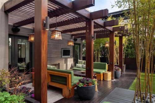Modern-Wooden-Pergola-Design-For-Patio-with-Wooden-Deck-and-Green-Sofa